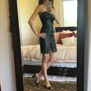 Leather zip up/down vixen dress.